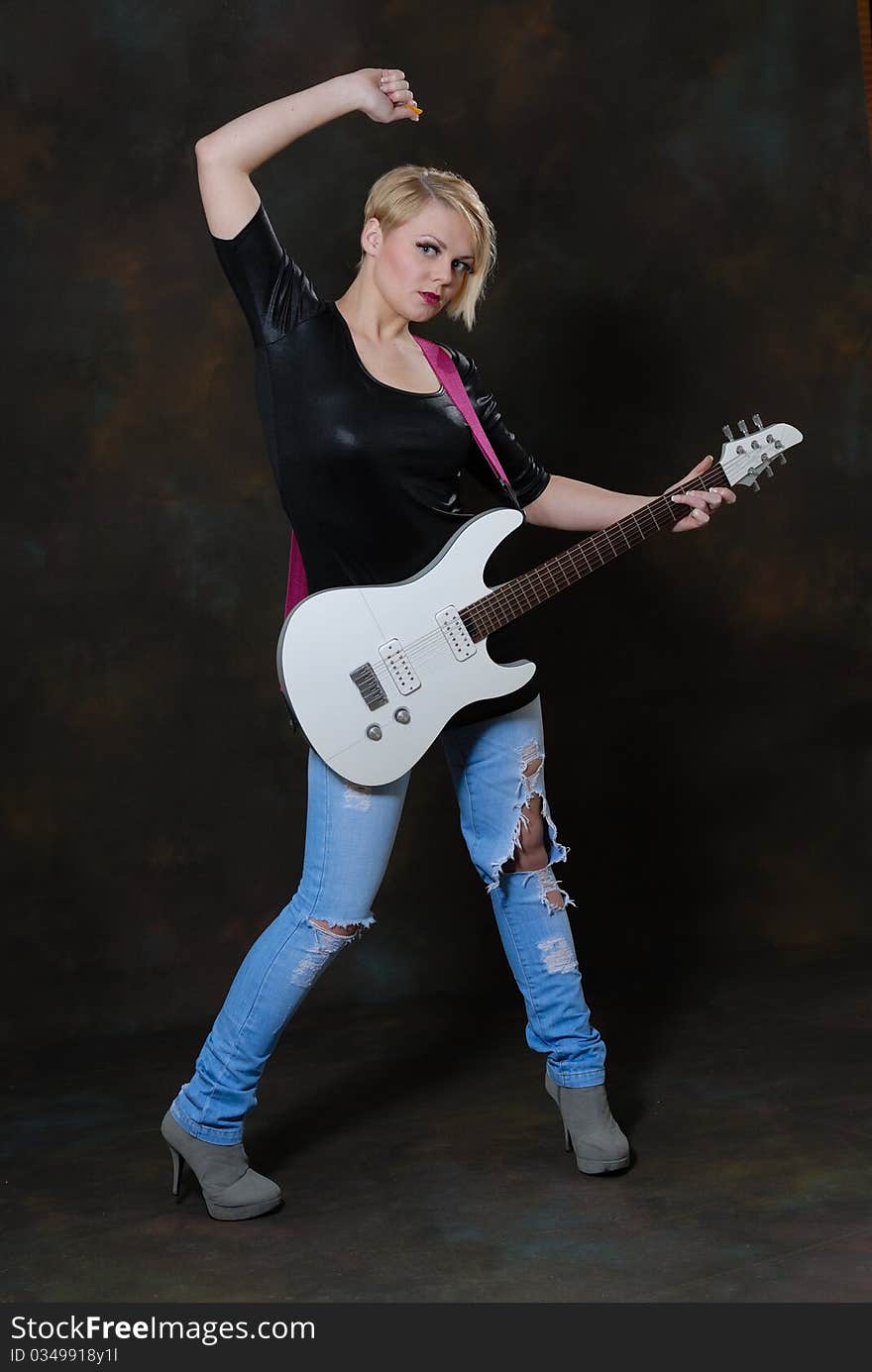 Pretty Young Female With Guitar