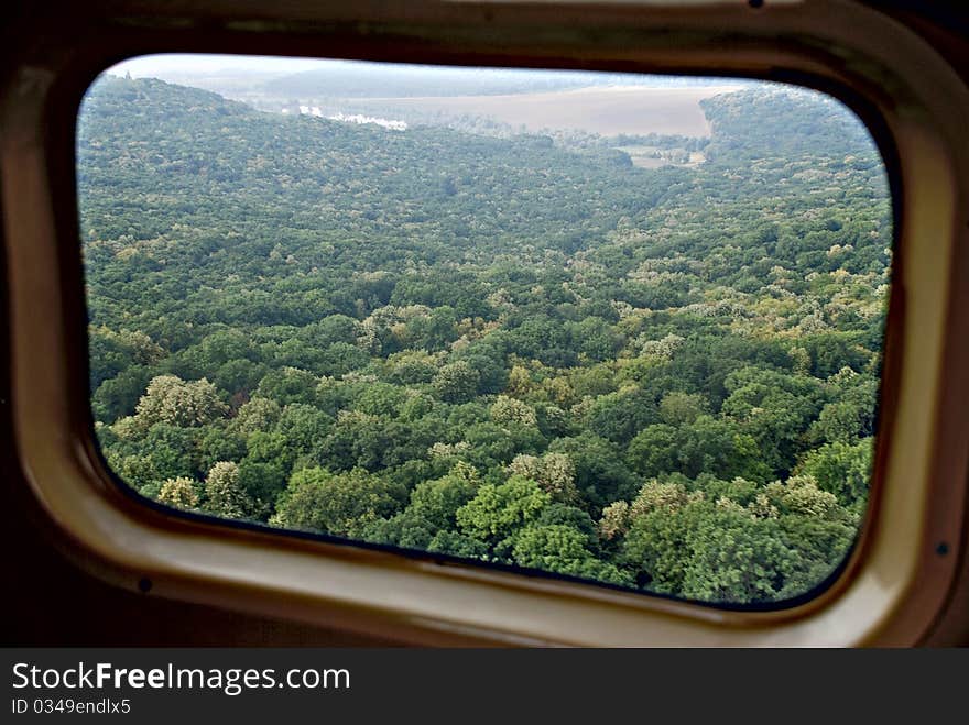 Forest Throught the window of helicopter