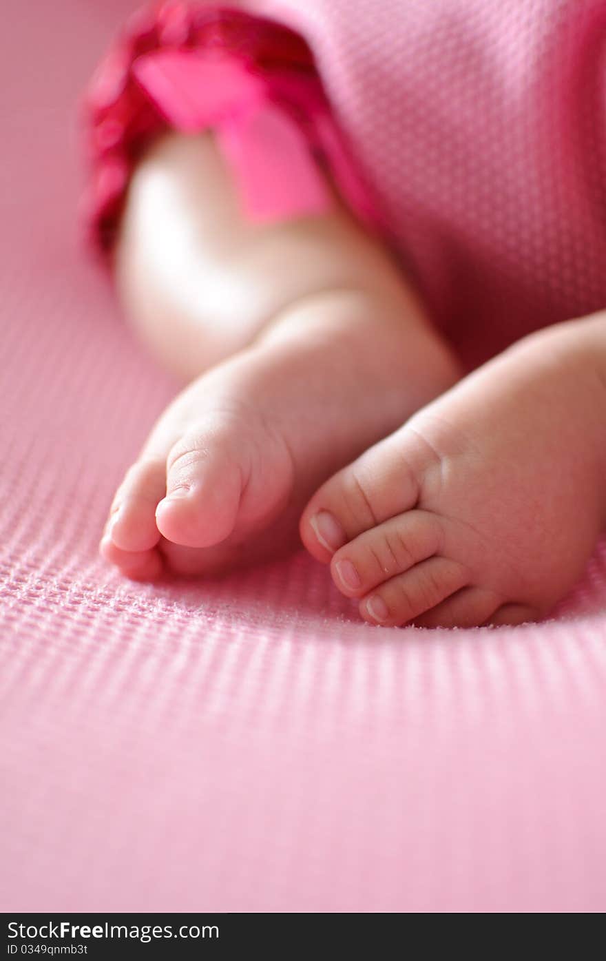 Baby foot photo taken on bed