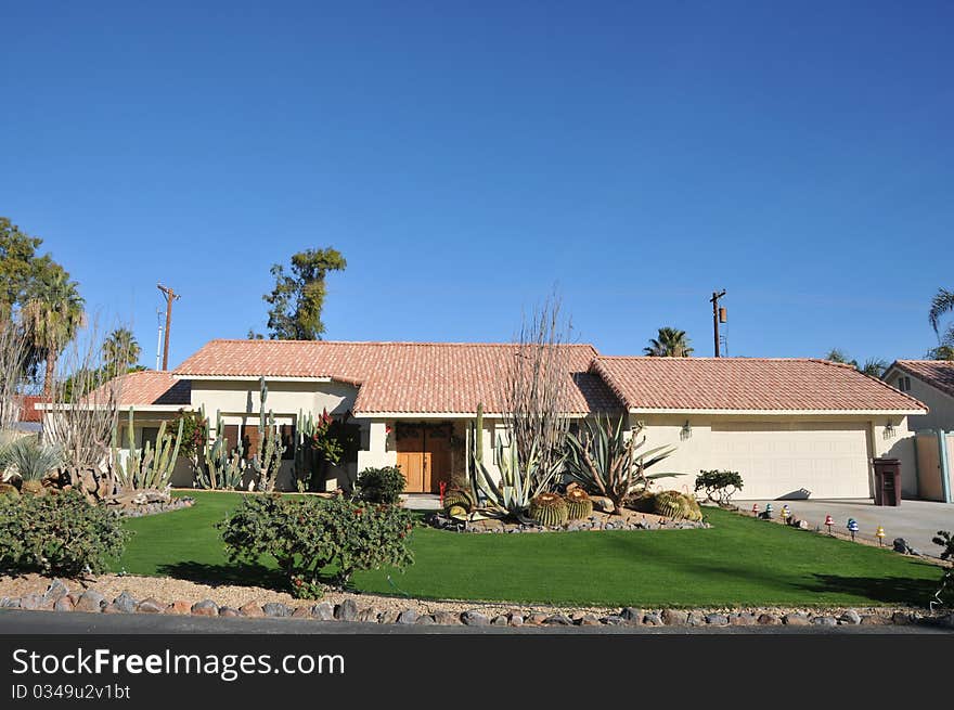 House surrounded by trees and grass