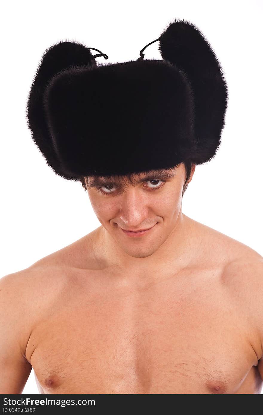 The dangerous adult man in Russian national cap isolated background