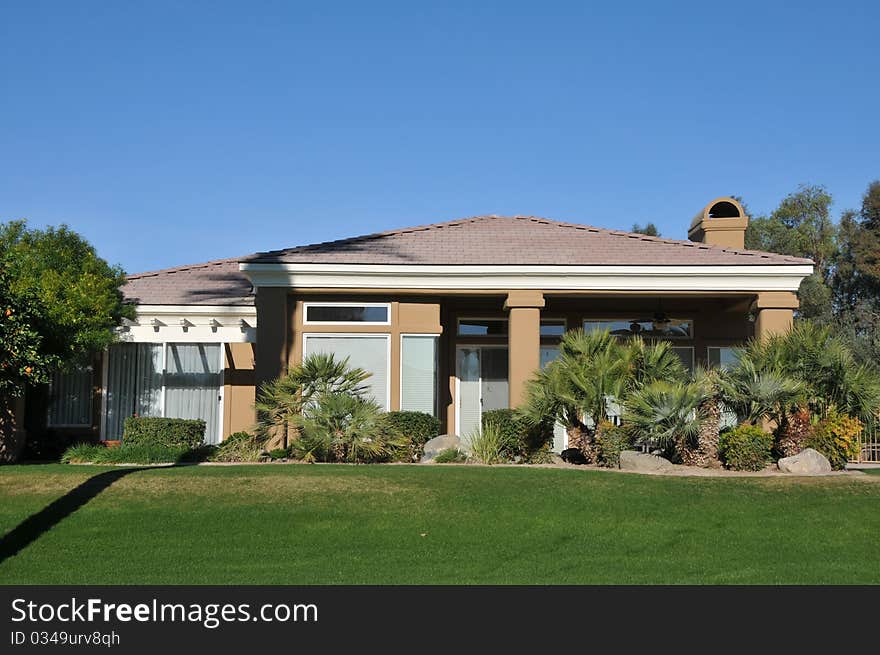 House surrounded by trees and grass