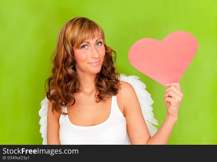 Female valentine angel amor holding heart. Female valentine angel amor holding heart