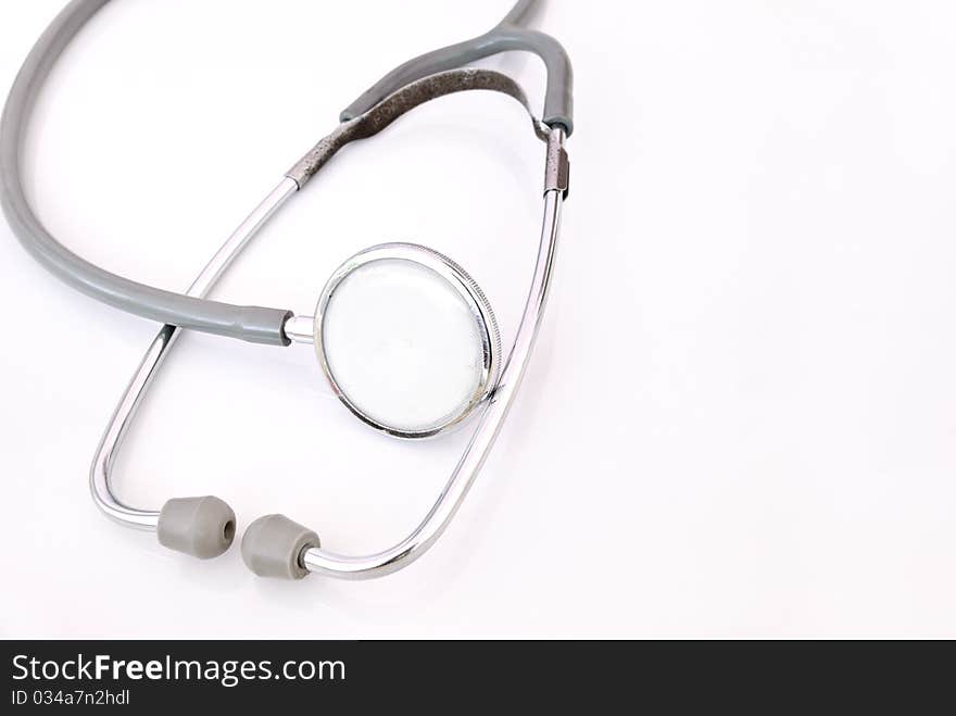 Medical stethoscope on white background.