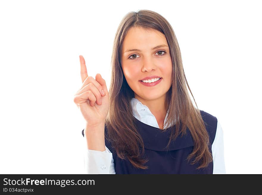 Beautiful European young businesswoman standing with hands folded against white background