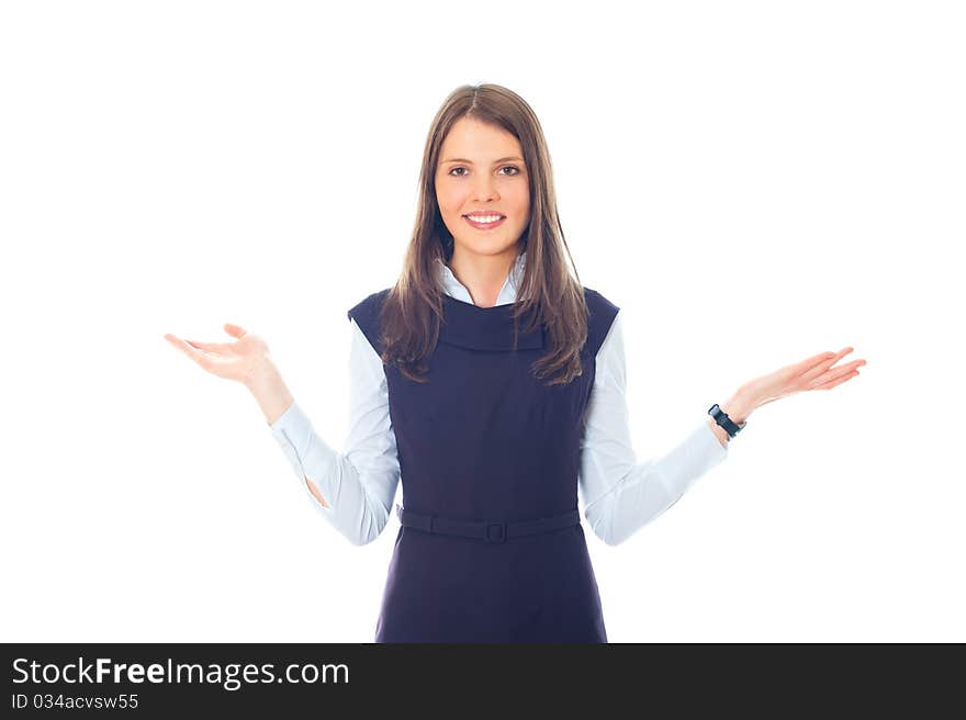 Beautiful European young businesswoman standing with hands folded against white background