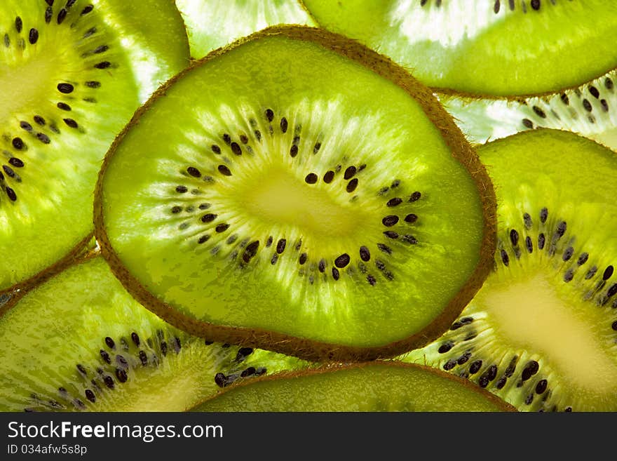 Kiwi slice closeup, macro details. Kiwi slice closeup, macro details