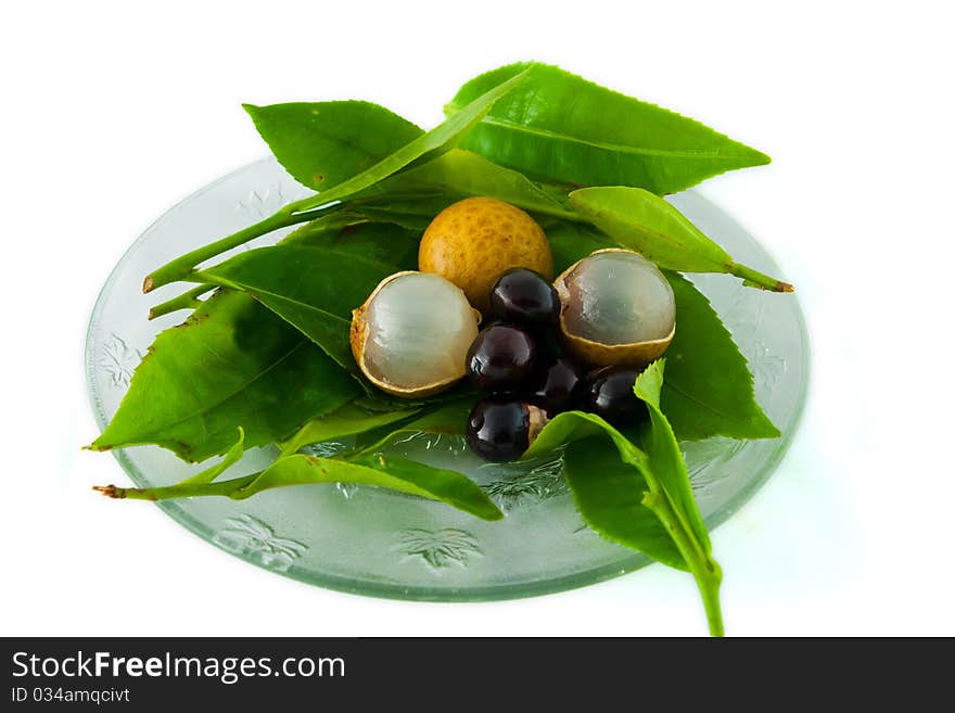 Closeup of longan fruit with some vegetables