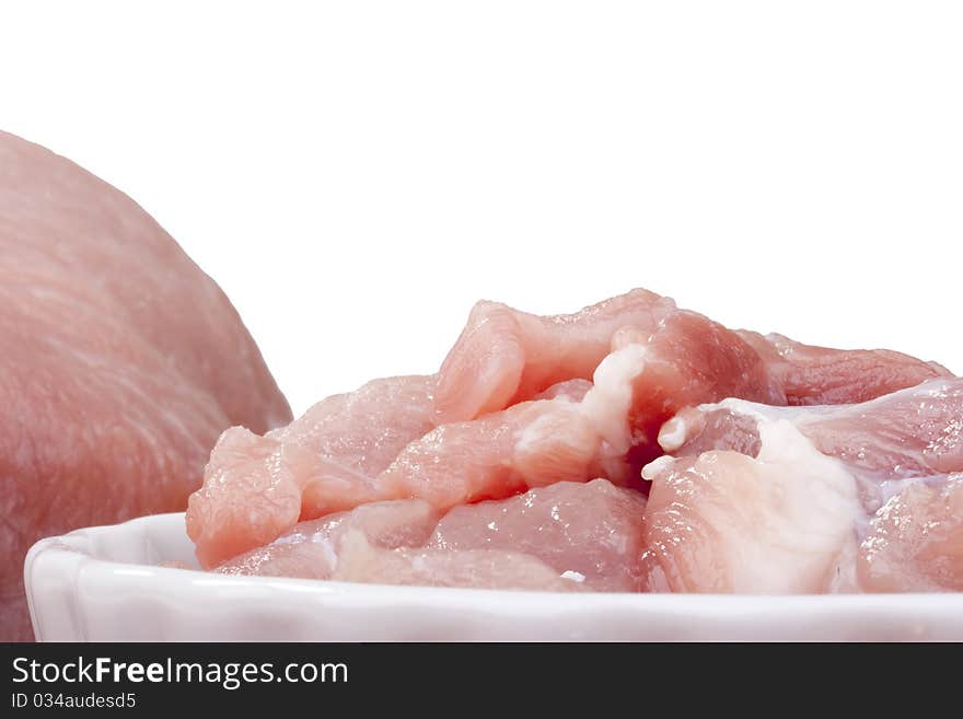 A piece of raw meat before cooking in the kitchen environment.