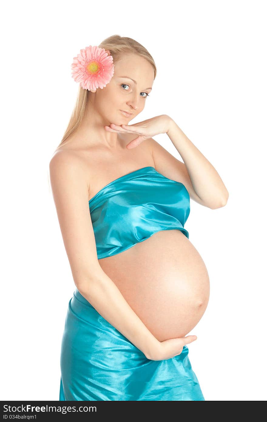 Pregnant woman holding her belly and flower. Pregnant woman holding her belly and flower