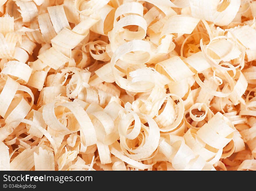 Wooden shaving texture. A heap of shavings. Wooden shaving texture. A heap of shavings.