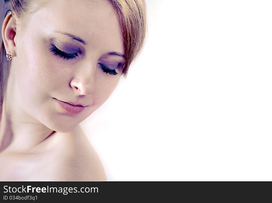 Close-up of beautiful woman face. Isolated On white background