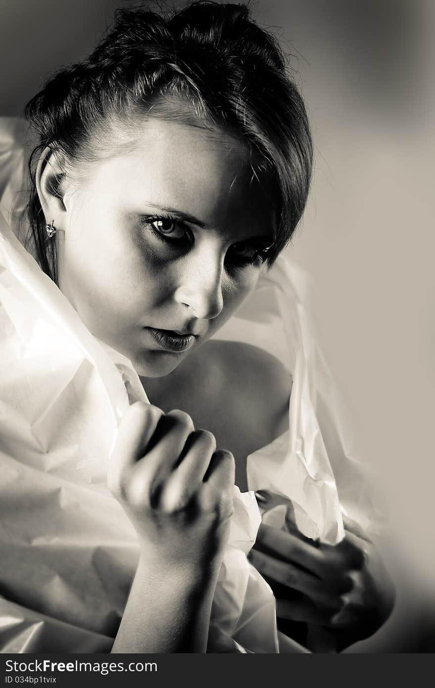 Creative Portrait of a girl with a white collar. black and white