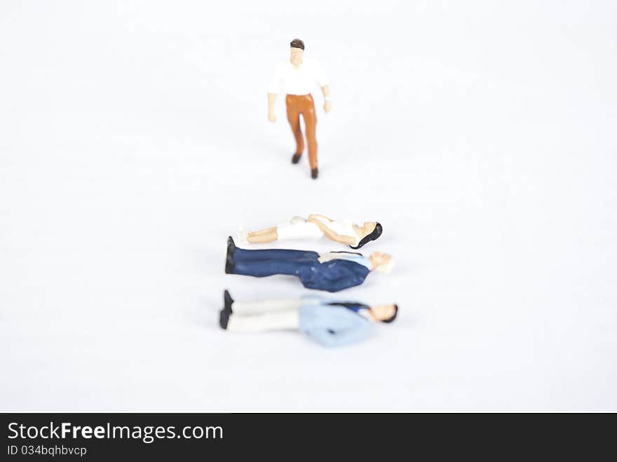 Miniature people on white background. Miniature people on white background