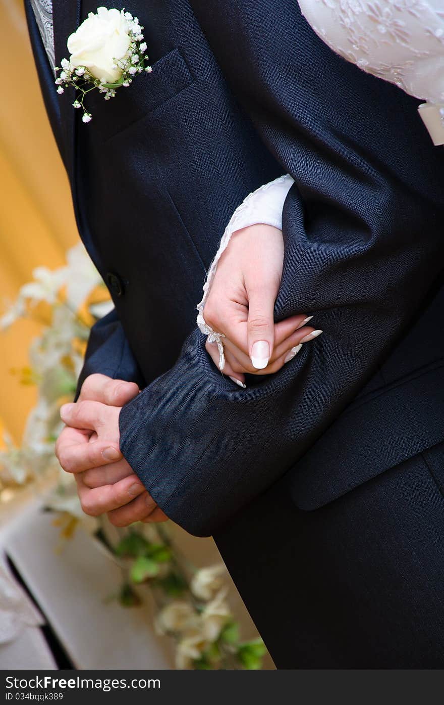 Arm in arm. wedding couple