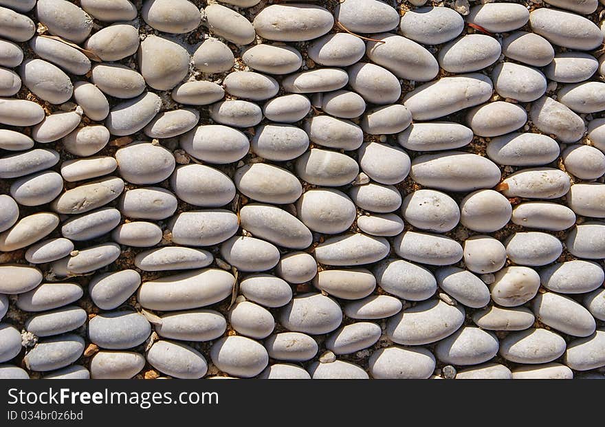 Pavement made of grey pebbles. Pavement made of grey pebbles