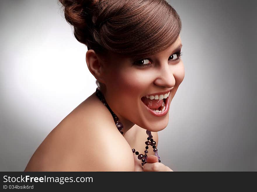 Close-up of a young woman smiling