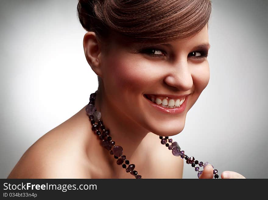 Close-up of a young woman smiling