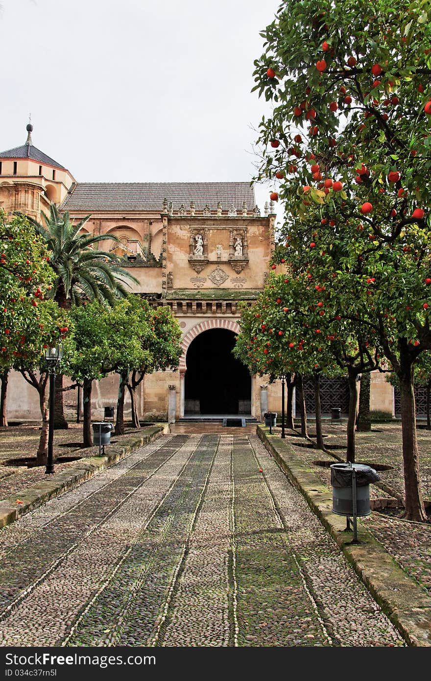 The Cathedral Mosque Entrance as seen from Los Naranjos Patio in Cordoba, Spain. The Cathedral Mosque Entrance as seen from Los Naranjos Patio in Cordoba, Spain