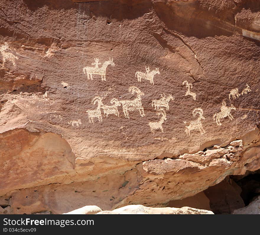 Horse and Ram Petroglyphs on red rock