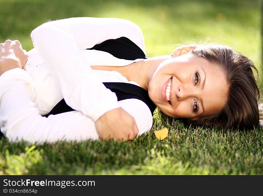 Portrait of a happy young woman smiling