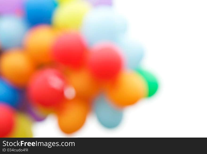 The balloons out of focus on a white background.