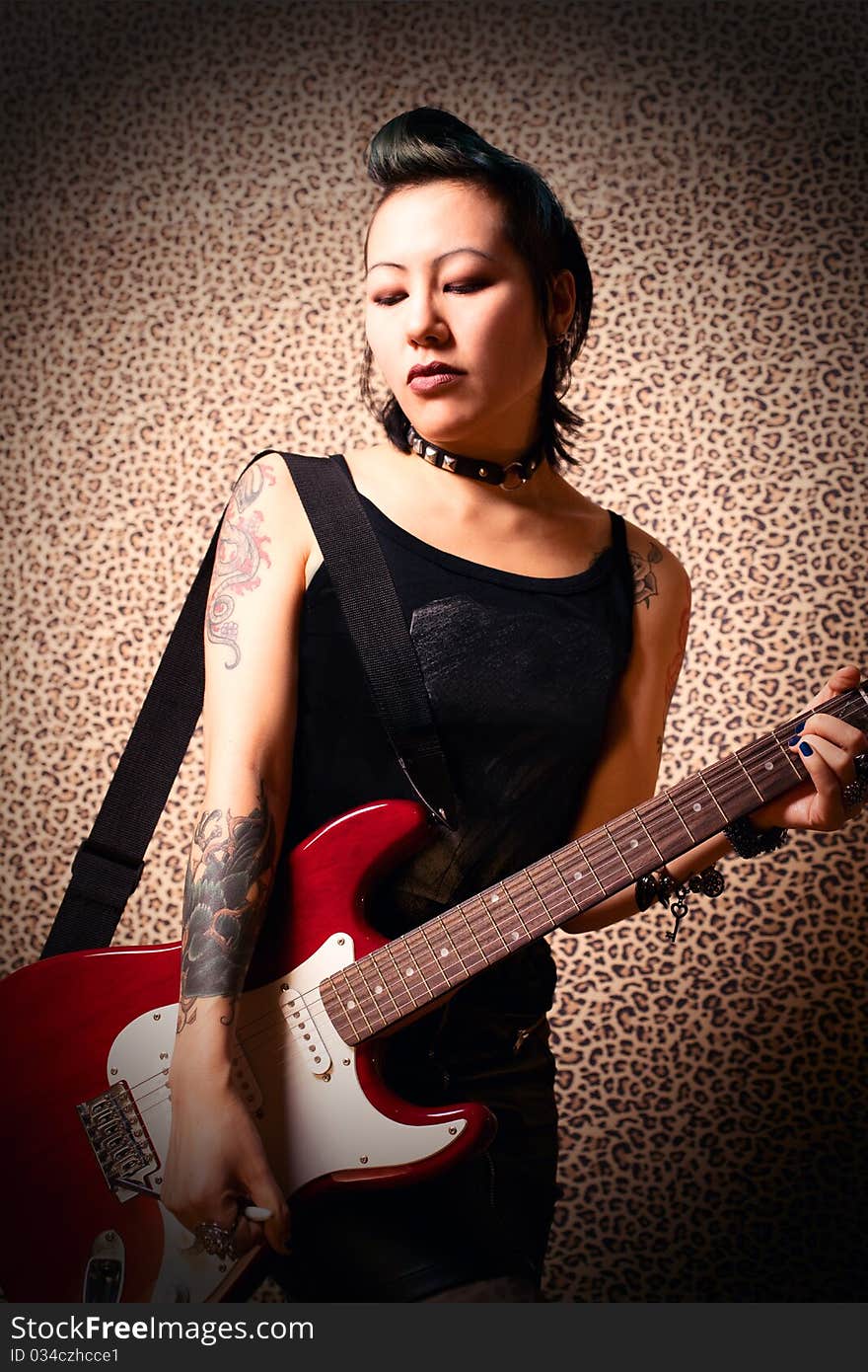 Gothic girl with red guitar. Gothic girl with red guitar