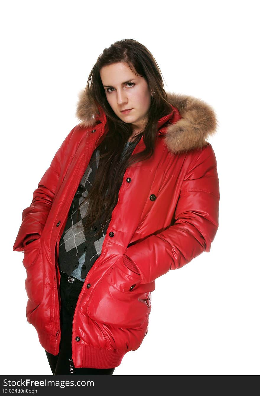 The girl in a red jacket on a white background