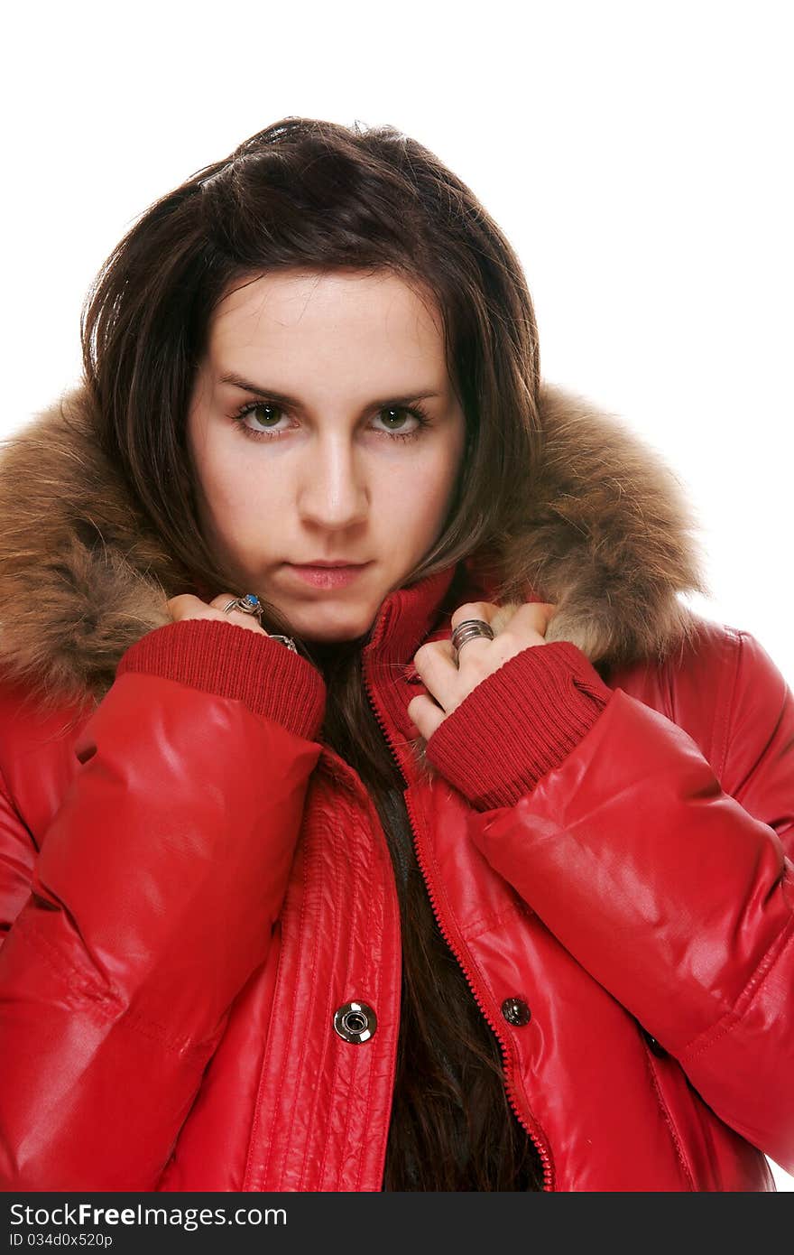 The girl in a red jacket on a white background