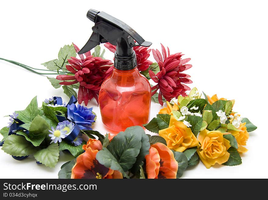 Colored bunches of flowers and spraying-bottle. Colored bunches of flowers and spraying-bottle