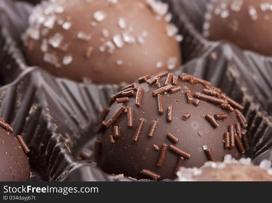 Truffle candy coated chocolate with decorative powdered for the occasion.