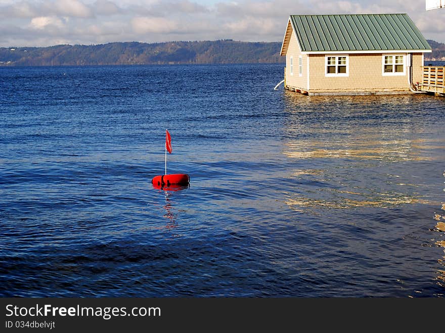 Diving flag on a red bouy