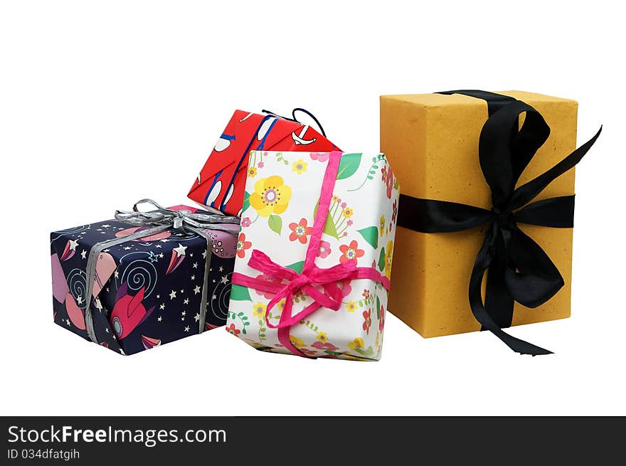 Multi-colored gift boxes on a white background