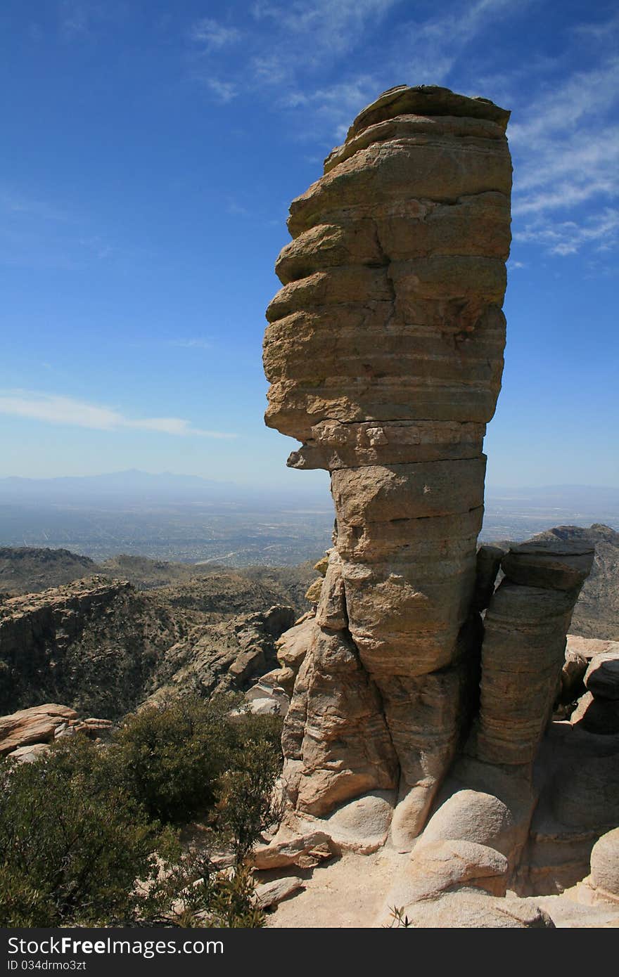 Rock formation standing over desert skyline. Rock formation standing over desert skyline