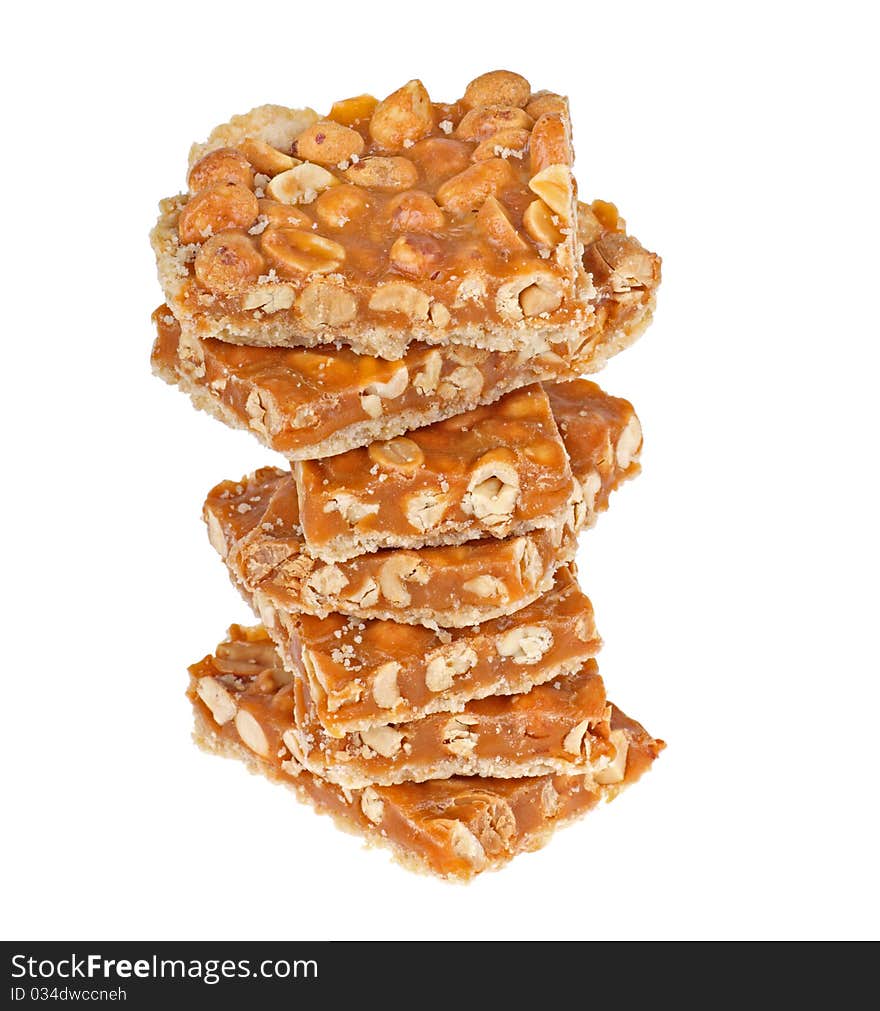 Stack of peanut butterscotch bars isolated on white