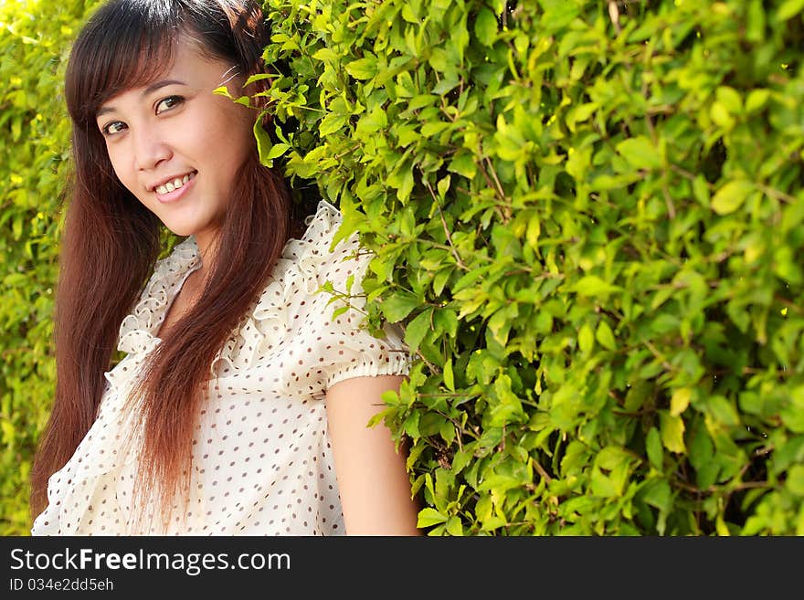 Young beautiful girl smiling outdoor. Young beautiful girl smiling outdoor