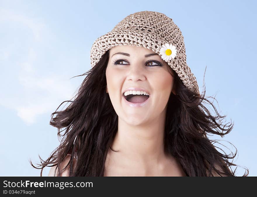 Girl with a smile and friendly expression on blue sky background. Girl with a smile and friendly expression on blue sky background