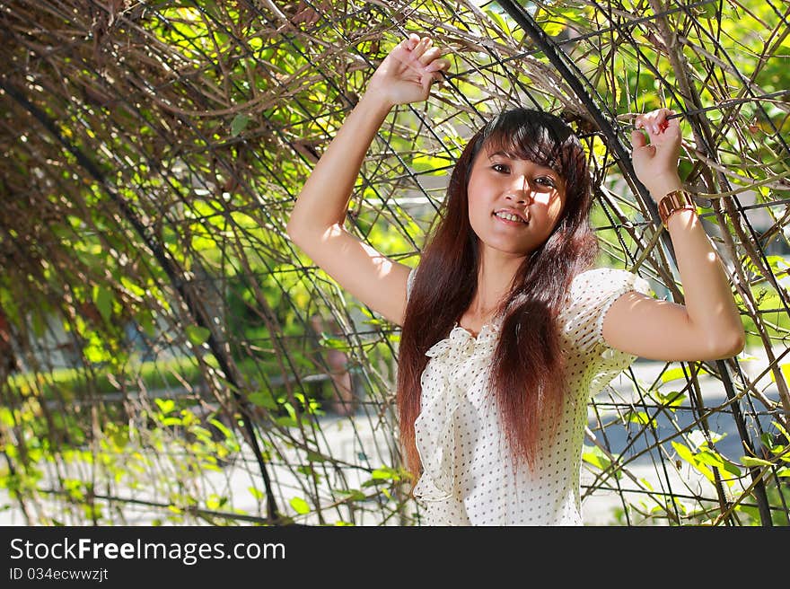 Young beautiful asian girl smiling