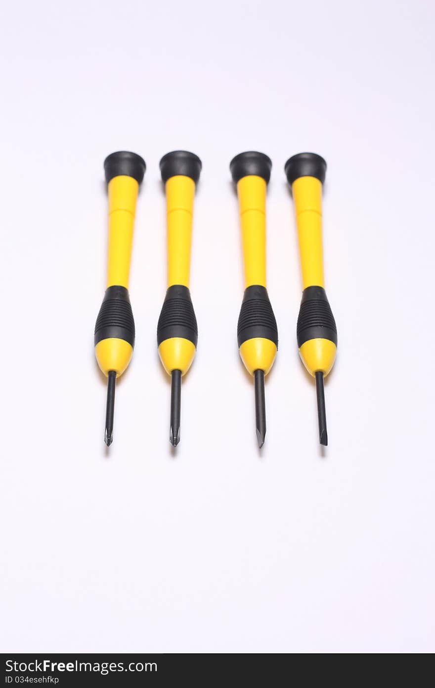 Four units of precision screwdrivers in differents sizes, plus and minus type