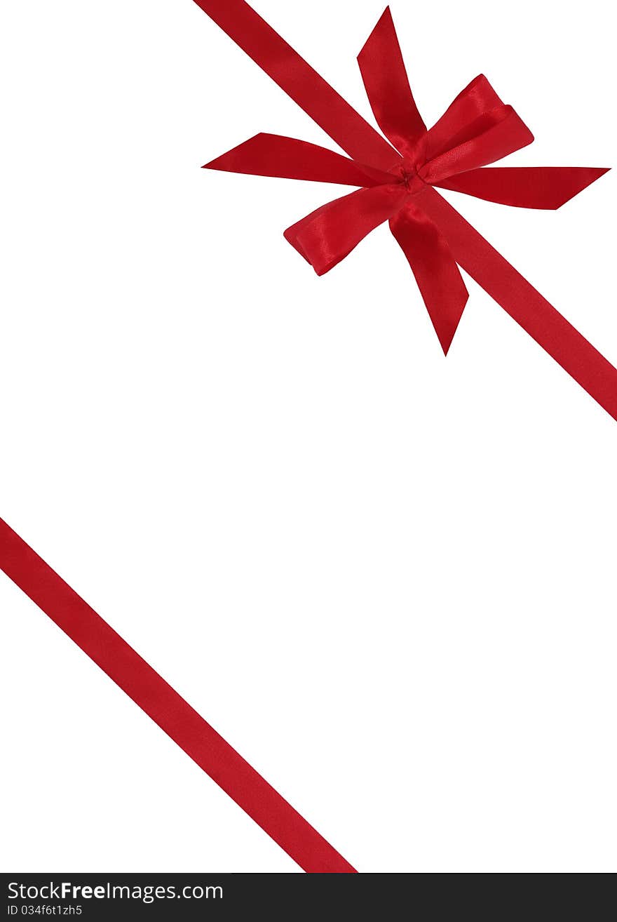 Red ribbon from bow on white background