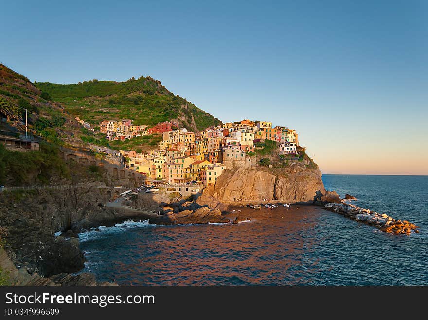 Small Town Manarola (Cinque Terre, Italy) during sunset. Small Town Manarola (Cinque Terre, Italy) during sunset