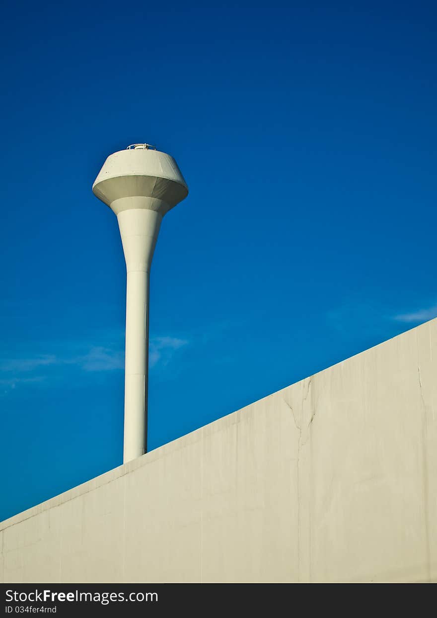 White water pump tower with blue sky. White water pump tower with blue sky