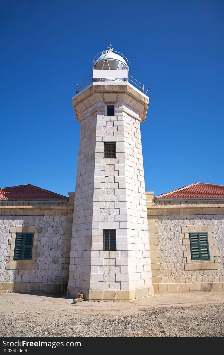 Lighthouse of Punta Nati at Menorca island in Spain. Lighthouse of Punta Nati at Menorca island in Spain