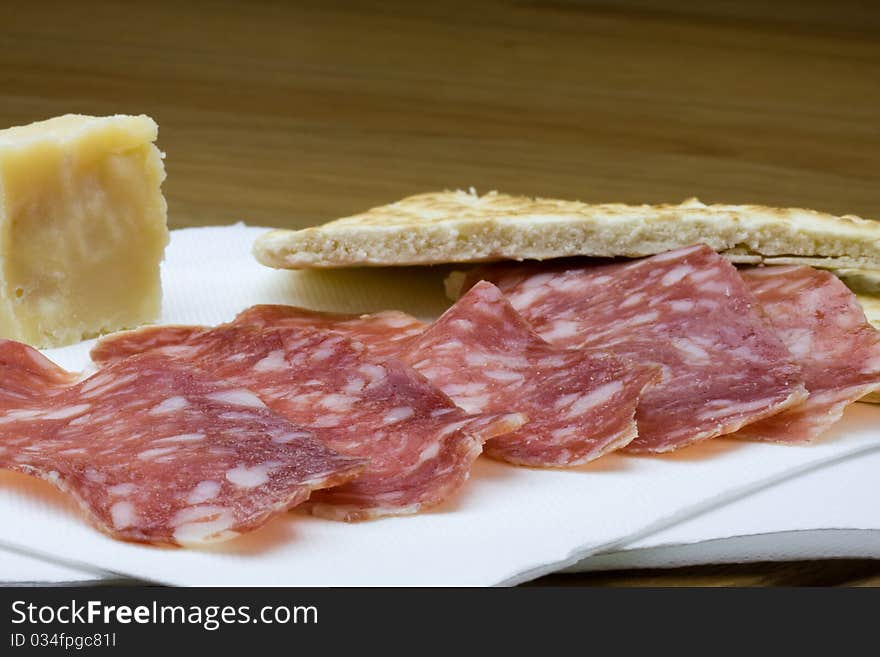 Piadina, salami and cheese snack. Piadina, salami and cheese snack