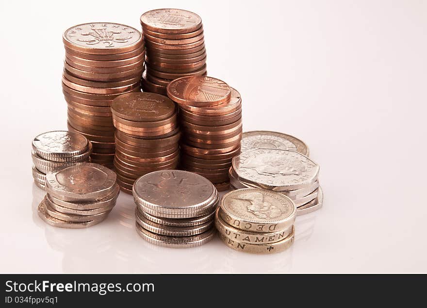 Piles of english coins