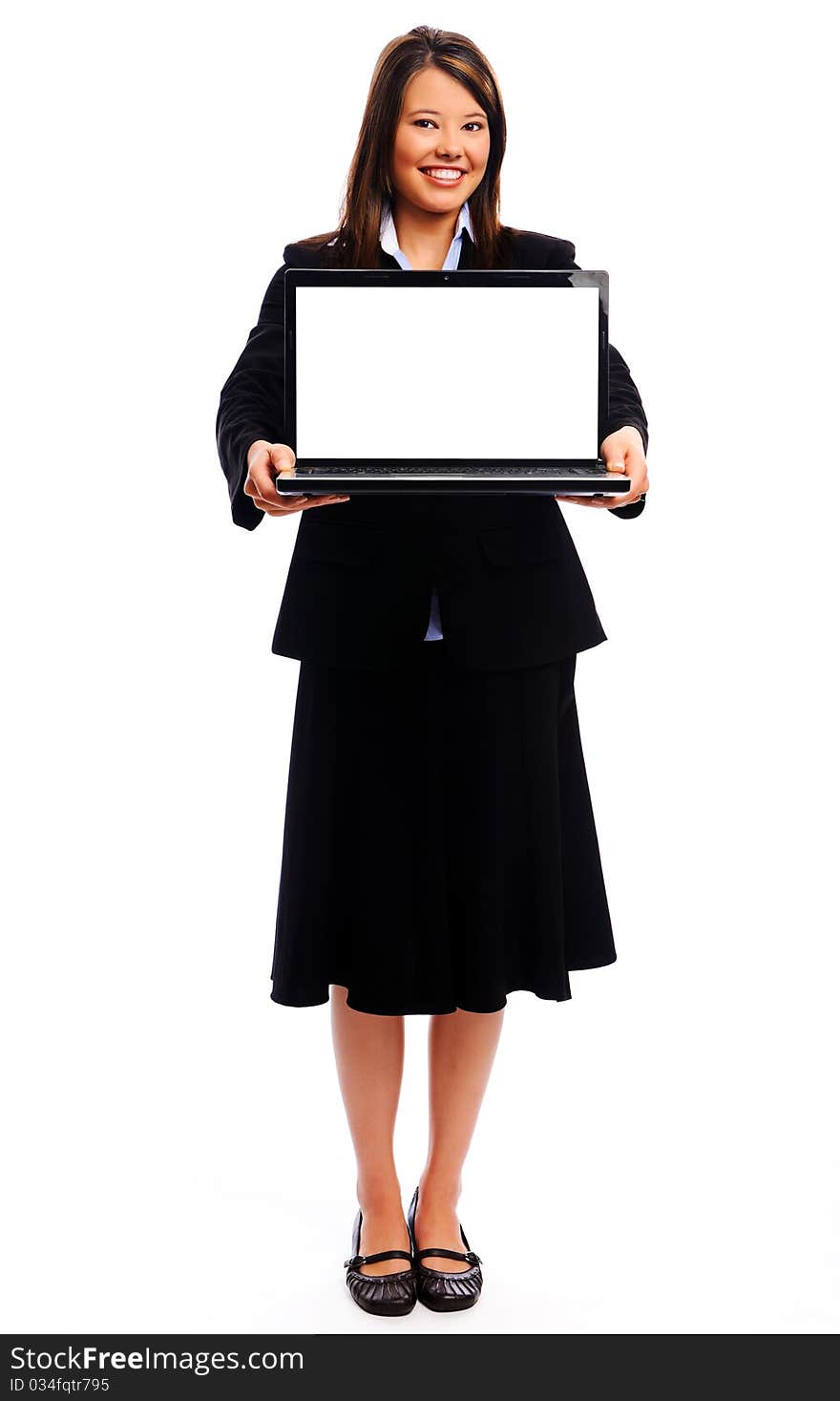 Businesswoman holding laptop