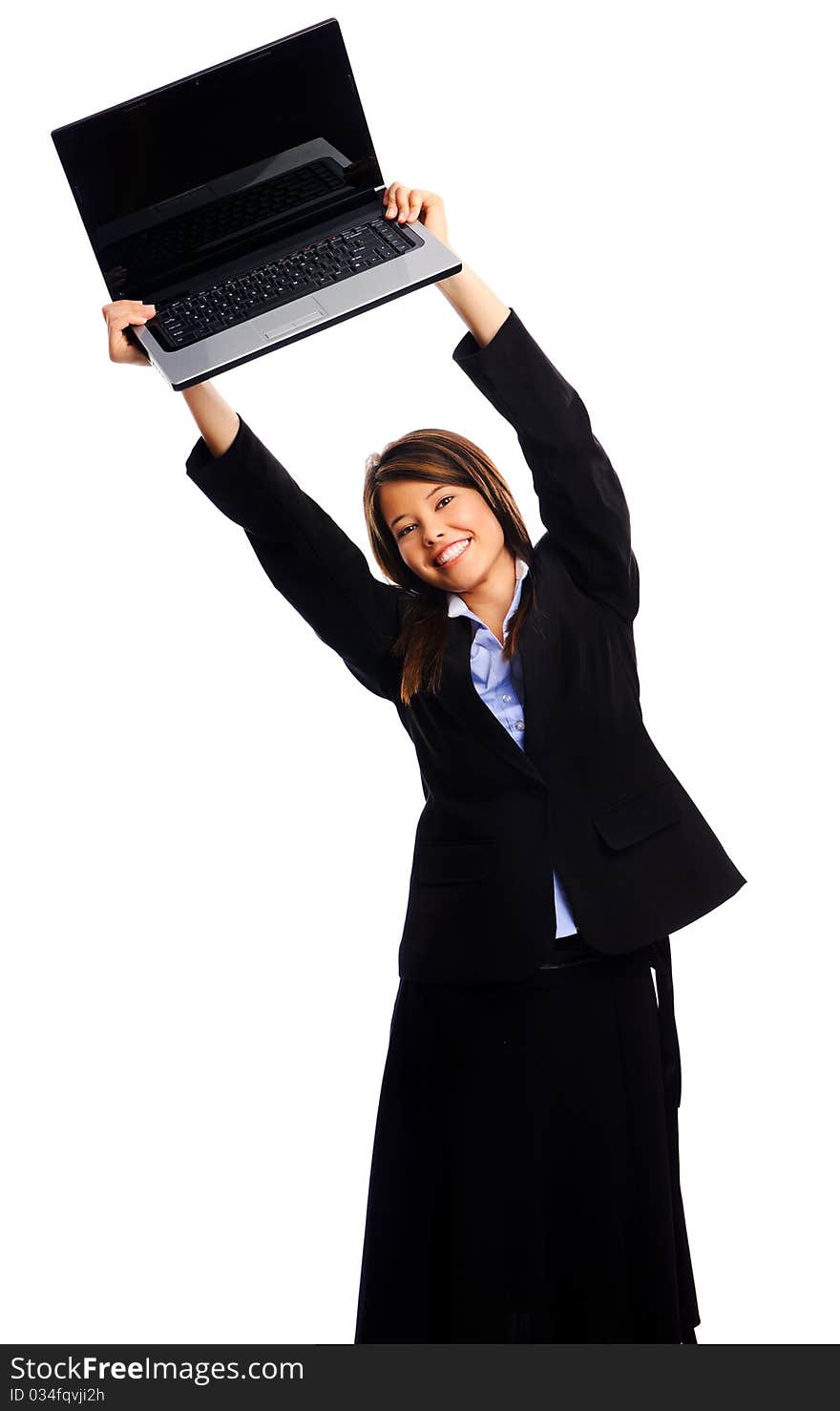 Businesswoman holding laptop