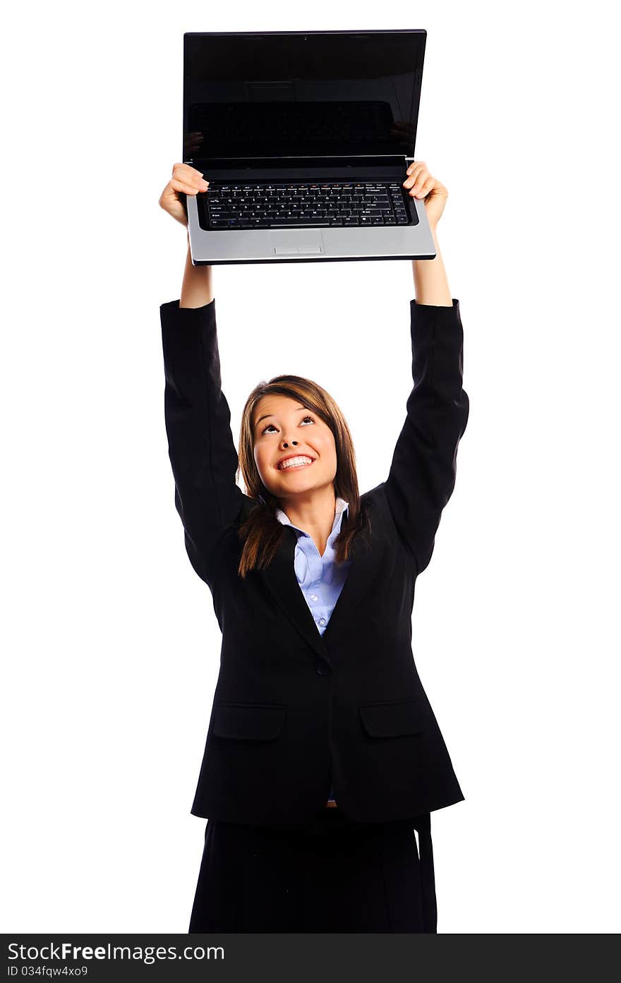 Businesswoman holding laptop