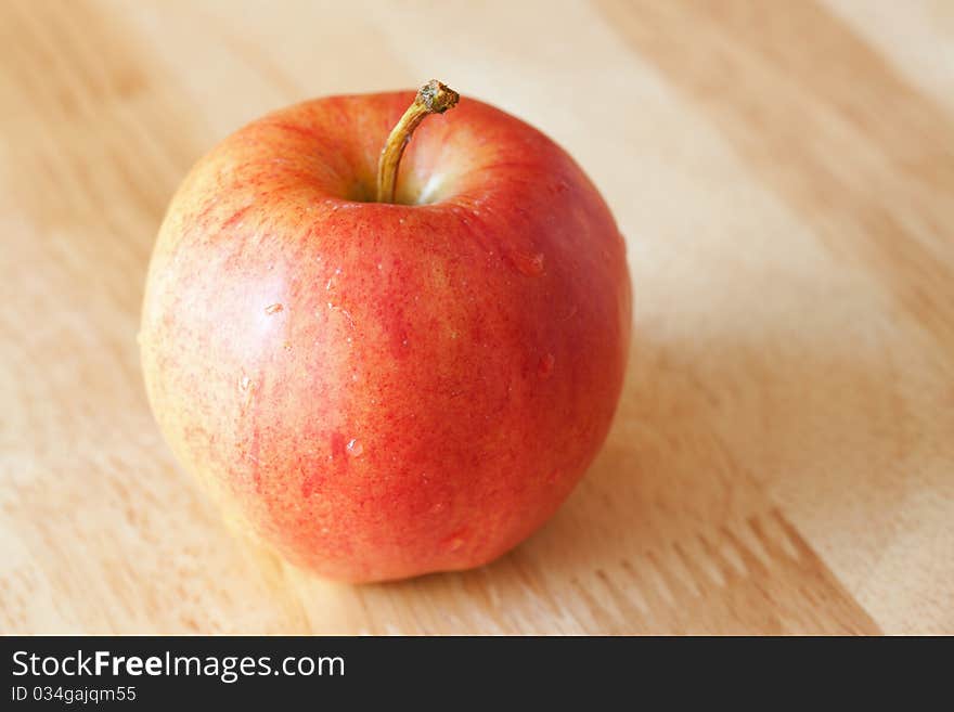 Apple on rustic wood background