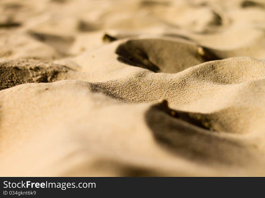 Golden sand on beach closeup